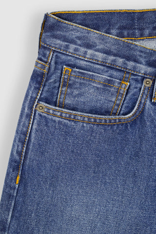 Close-up of the Barbanera Bandito cloud blue jeans highlighting the metal rivet detail on the pocket corner, showcasing craftsmanship and durability.