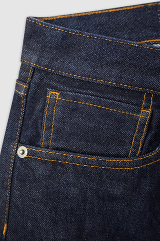 Close-up of the front pocket on Barbanera Bandito dark rinsed jeans, showing the clean stitching, rivet detail, and texture of the dark indigo denim fabric.
