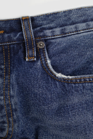 Close-up of Barbanera Bandito jeans copper rivets showing craftsmanship and durability