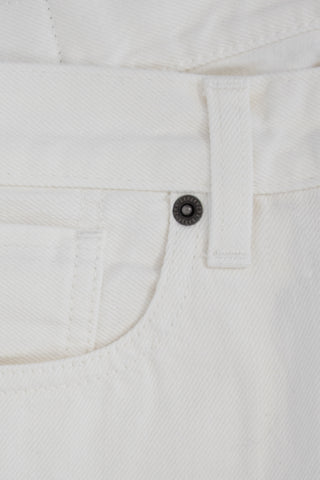 Close-up of the Barbanera Bandito off-white jeans showing the metal rivet detail on the front pocket, emphasizing craftsmanship and durability.