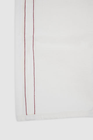 Close-up of the Barbanera Bandito off-white jeans featuring the selvedge edge, showcasing premium denim construction.