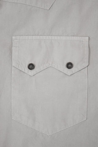 Close-up of the chest pocket on the Barbanera Carlito ash western shirt, showing the pointed flap, horn snap button, and detailed stitching.