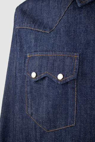 Close-up of Barbanera Carlito raw denim shirt displaying fabric texture, stitching and snap buttons details