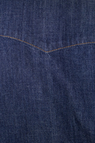 Close-up of the Barbanera Carlito raw denim shirt stitching, showcasing detailed craftsmanship and durable seam work on the raw denim fabric.