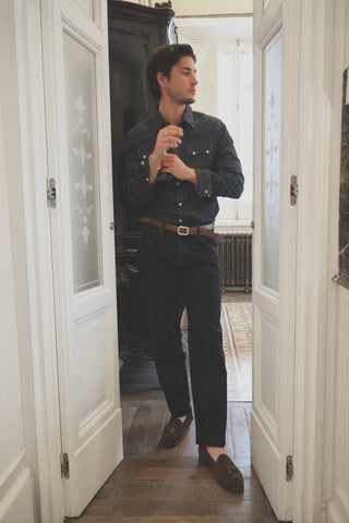 Lifestyle front view of the Barbanera Carlito raw denim shirt, featuring its classic cut and rich dark indigo raw denim fabric.