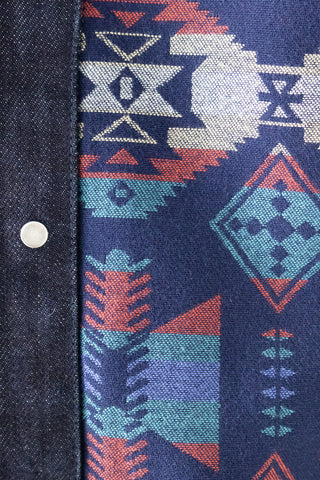 Close-up of the interior lining of Barbanera Dane deep blue denim vest, featuring smooth fabric with detailed stitching.