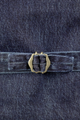 Close-up detail of the Barbanera Dane deep blue denim vest showing the adjustable back regulator with metal buckle and stitching.