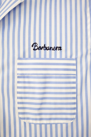 Close-up of the chest pocket on the Barbanera Earl bowling shirt in light blue with white stripes, highlighting detailed stitching and fabric texture.