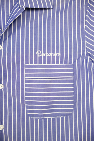Close-up of the chest pocket on the Barbanera Earl bowling shirt in navy blue with white stripes, showcasing detailed stitching and fabric texture.