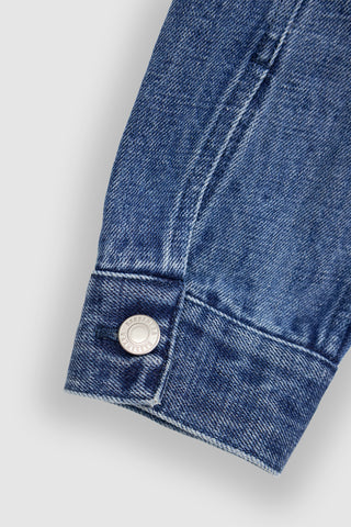 Close-up of the cuff on the Barbanera Fallen Cloud blue jacket, highlighting the stud button closure, stitching, and structured finish.