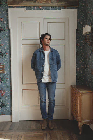 Lifestyle front view of the Barbanera Fallen Cloud blue selvedge denim jacket worn indoors, highlighting the structured fit and classic denim detailing.