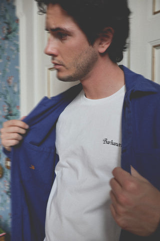 Close-up lifestyle detail of the Barbanera Fallen cobalt blue jacket, highlighting fabric texture and stitching.