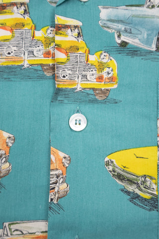 Close-up of the button detail on the Barbanera HTS bowling shirt, showing the stitching and how the vintage cars pattern aligns around the buttons.