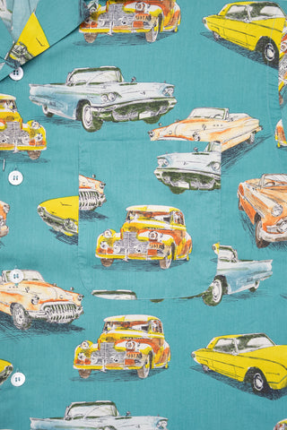 Close-up of the Barbanera HTS bowling shirt, highlighting the vibrant vintage cars pattern and the fine texture of the lightweight fabric.