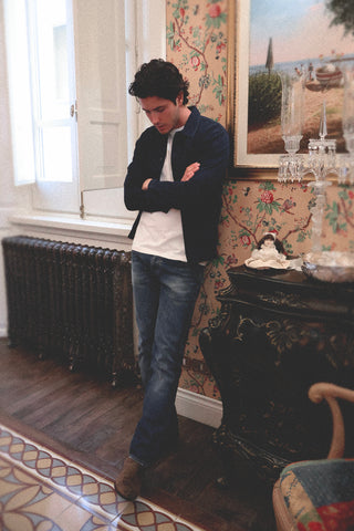 Lifestyle front view of the Barbanera Jericho dark rinsed overshirt, showcasing its rugged denim texture, classic button-up front, and casual fit styled indoors.