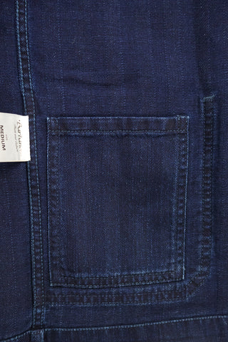 Close-up of the internal pocket detail inside the Barbanera Jericho rinsed blue overshirt, showing fabric texture, stitching, and pocket construction.