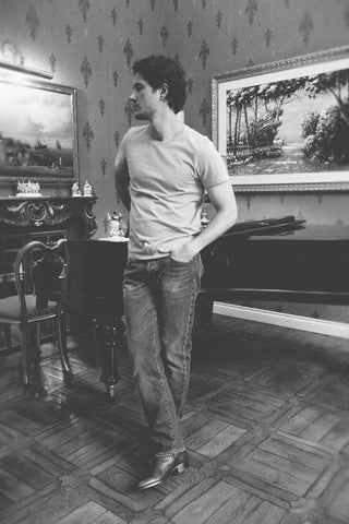 Lifestyle front view of the Barbanera Lewis ash t-shirt worn casually indoors, showcasing the soft ash gray fabric and regular fit.