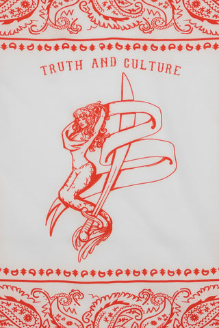 Close-up of the Barbanera Lorelei red bandana, highlighting the intricate mermaid print and detailed pattern work.