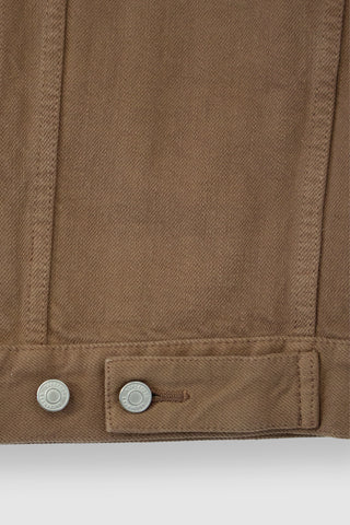Close-up of the back adjusters on the Barbanera Neil camel selvedge denim jacket, showing metal buckle details and sturdy stitching on the denim fabric.