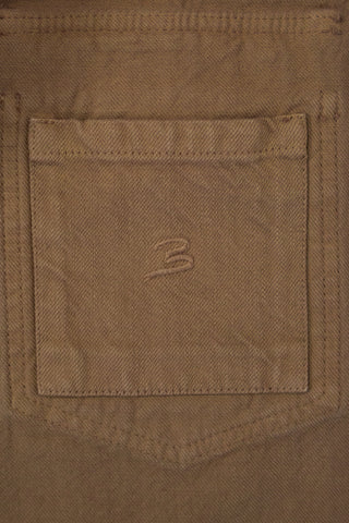Close-up of the internal pocket inside the Barbanera Neil camel selvedge denim jacket, showing the fabric lining and neat stitching.