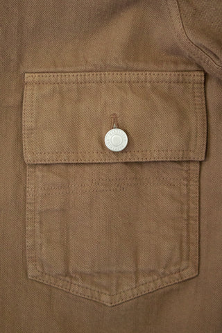 Close-up of the chest pocket on the Barbanera Neil camel selvedge denim jacket, showing the flap design, sharp stitching, and durable selvedge denim texture.