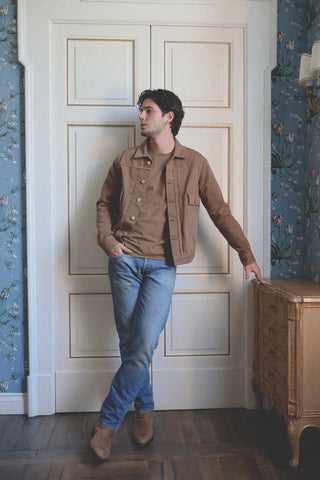 Lifestyle front view of the Barbanera Neil camel selvedge denim jacket showcasing the warm camel tone, structured silhouette, and classic front button closure.