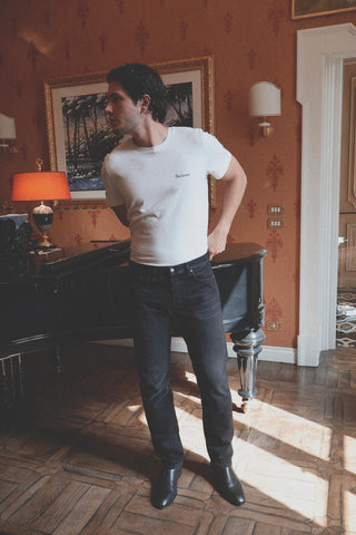 Lifestyle front view of the Barbanera Vince black bandana print tee, styled casually with black jeans, showcasing the heart side logo print.