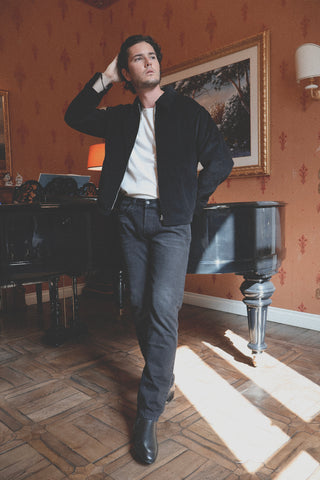 Lifestyle front view of the Barbanera Linus black heritage jacket, showcasing its structured fit and classic design details.