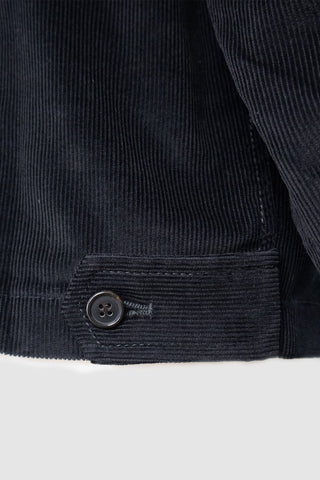 Detail view of Barbanera Linus Heritage jacket in black showing horn button